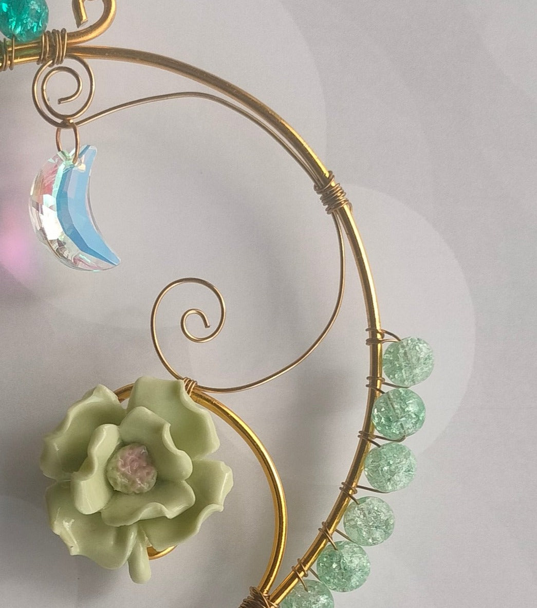 Teal and sea green suncatcher